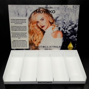 Hair care - brush stand. White acrylic with printed / branded back.